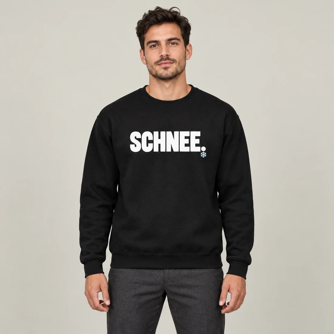 Schwarzer Unisex-Pullover: Weißer Schriftzug SCHNEE. mit kleiner blauer Schneeflocke